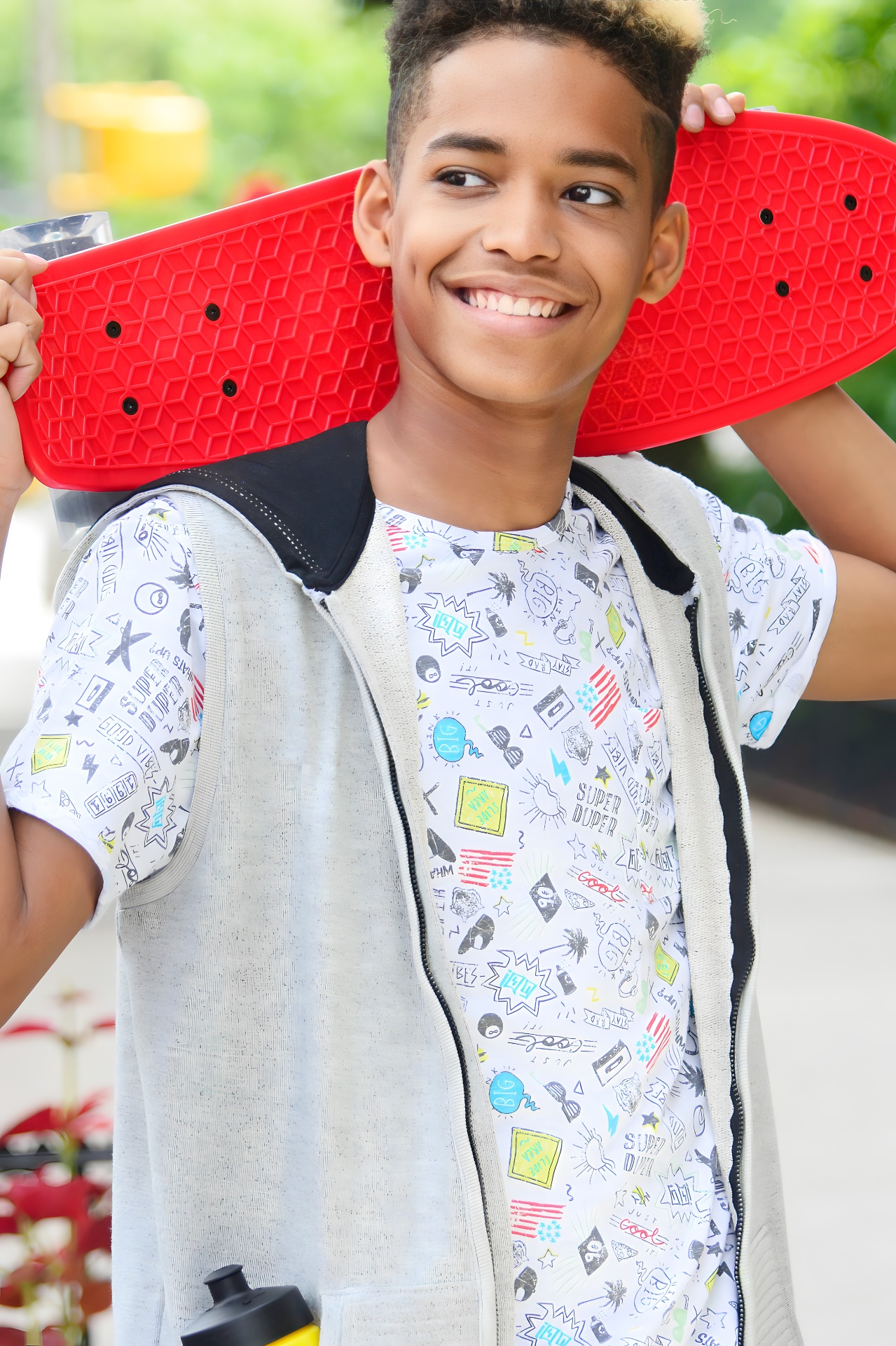 Teen boy with red skateboard — NYC child model portrait by Dorothy Shi