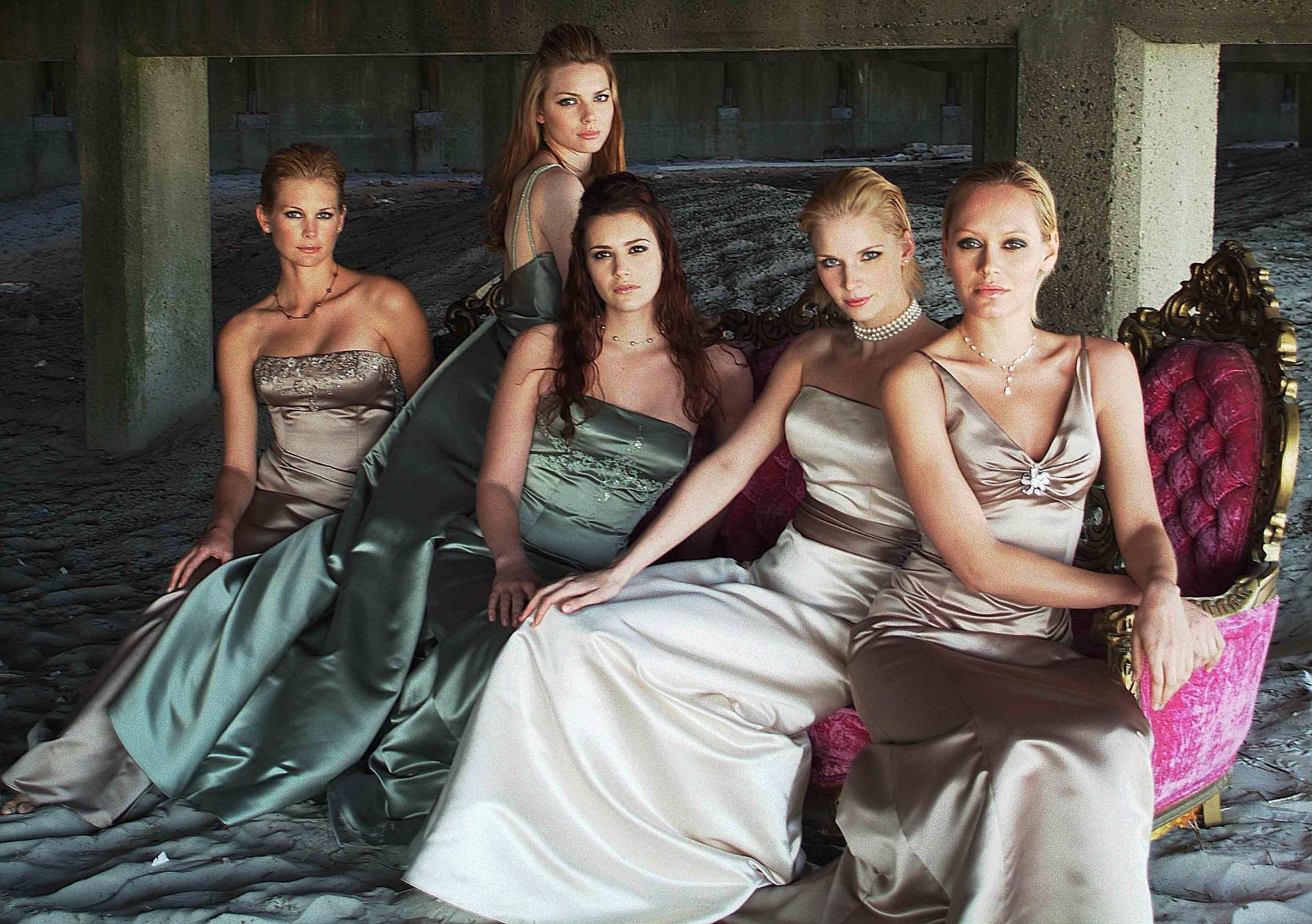 Editorial fashion group portrait in formal gowns