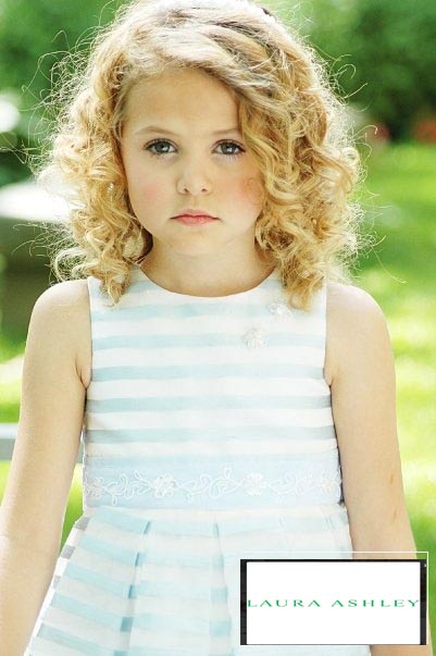 Laura Ashley child model in striped dress, NYC ecommerce shoot