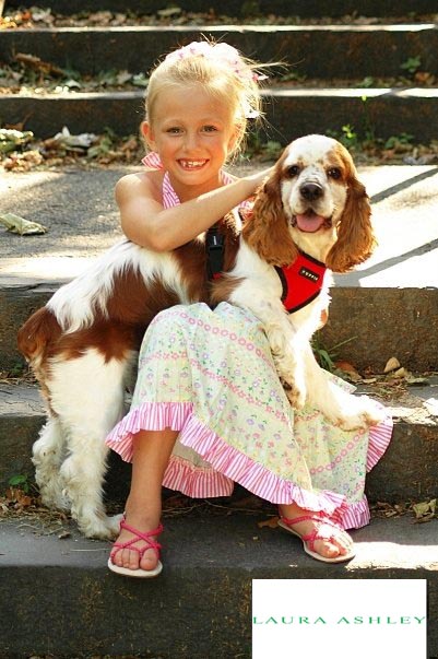 Laura Ashley child model with dog on stone steps, NYC lifestyle