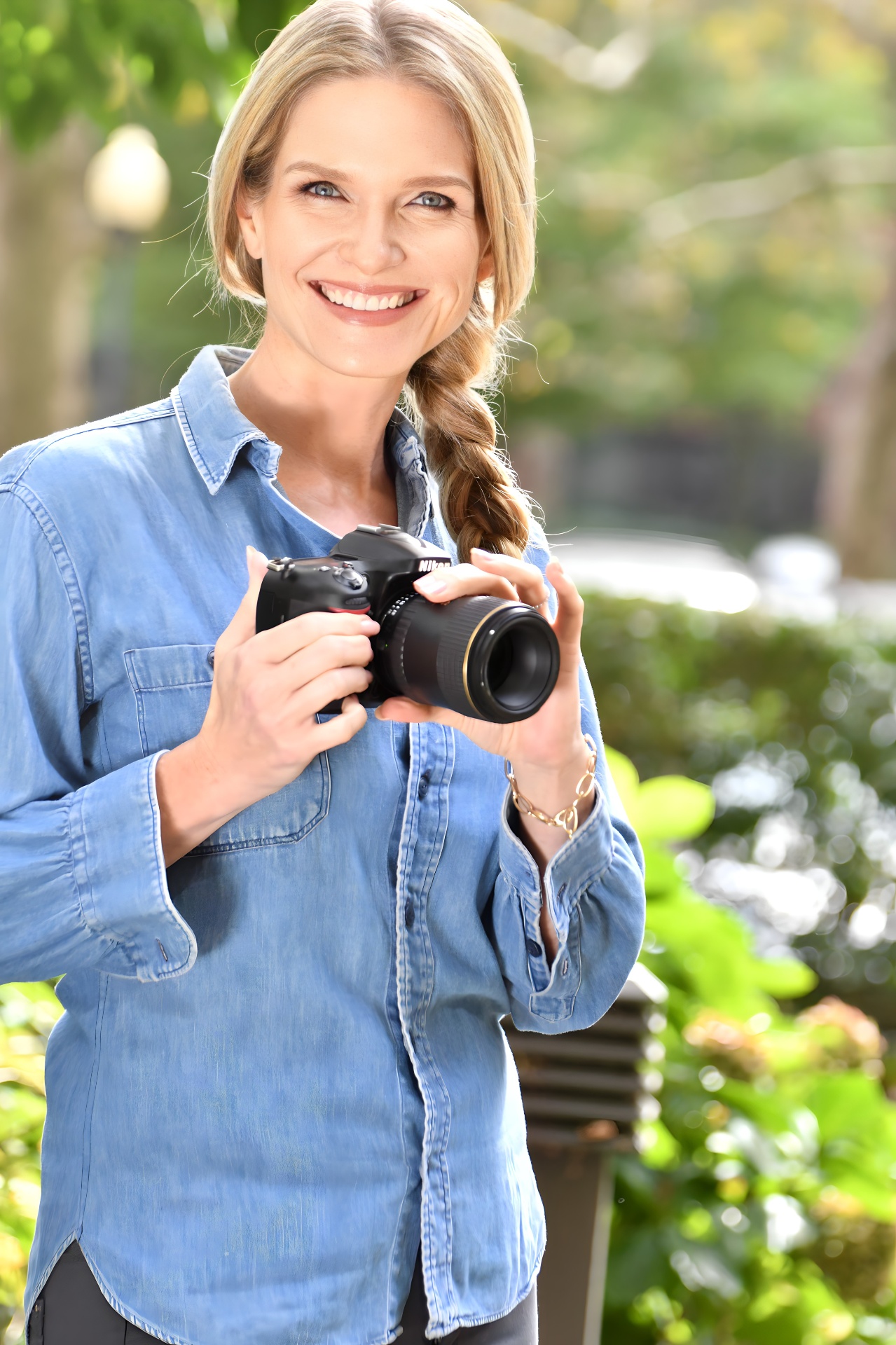 Commercial lifestyle — photographer in denim shirt outdoors, NYC